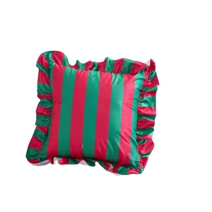 Festive red and green striped velvet throw pillow cover with elegant ruffled edges