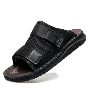 Casual black mesh velcro slides with brown cushioned insole and white stitching