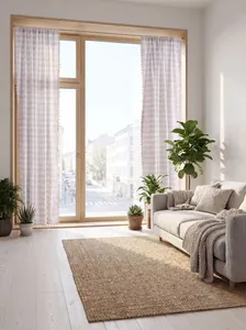 Modern striped curtains with decorative tassels in a bright minimalist room