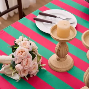 Elegant red and green striped tablecloth for festive banquet and luxury dining room decor