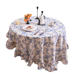 French retro round tablecloth featuring blue floral prints and an elegant ruffle hem
