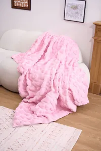 Soft pink heart-patterned sculpted faux fur throw blanket for cozy home lifestyle decor