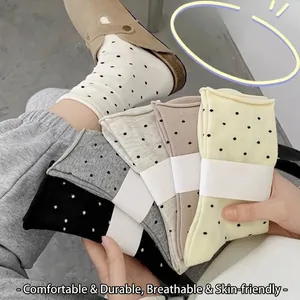 Comfortable cream-colored polka dot cotton crew socks for women in preppy style