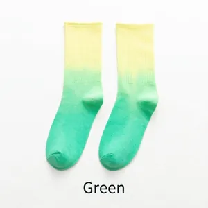 Vibrant yellow and green dip-dye gradient crew socks for sports and skateboarding
