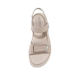 Comfortable beige sporty casual sandals for women featuring adjustable Velcro straps