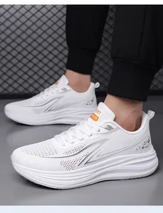 Detail of breathable white fly-woven men's running shoes with soft shock-absorbing soles