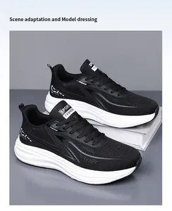 Detailed close-up of breathable black mesh running shoes with thick cushioned white soles