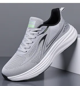 Macro view of breathable flyknit mesh and cushioned sole on grey men's running shoes