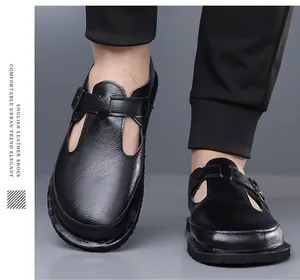 Close-up of men's retro black leather sandals featuring a stylish hollow buckle design.