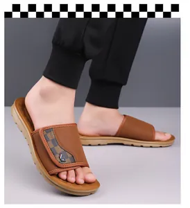 Close-up of men's brown casual summer slides featuring textured sole and checkered strap detail