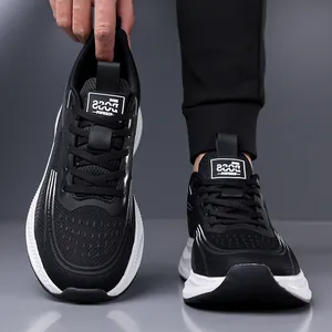 Men's breathable mesh running shoes in black and white with lace-up design