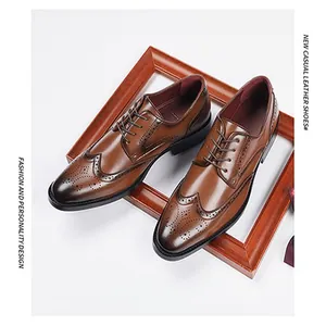 Detail view of brown leather brogue shoes with intricate wingtip perforation