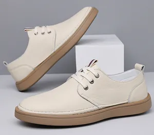 Detailed side view of beige men's genuine leather casual shoes with soft soles