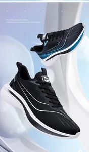 Close-up of breathable mesh running shoes for men with lightweight white soles