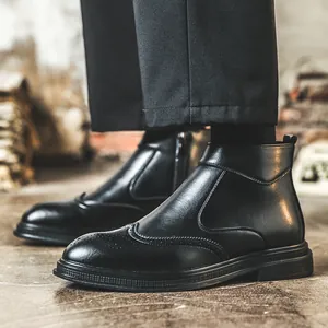 Stylish black leather Brogue Martin boots featuring classic vintage wingtip design