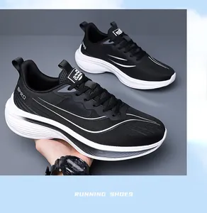 Close-up of black and white breathable mesh running shoes for men with thick soles