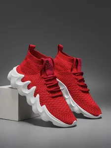 Red high-top flyknit running sneakers for men featuring unique wavy white cushioned soles