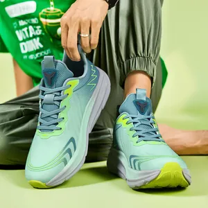 Lightweight breathable mesh running shoes in gradient green for outdoor fitness.
