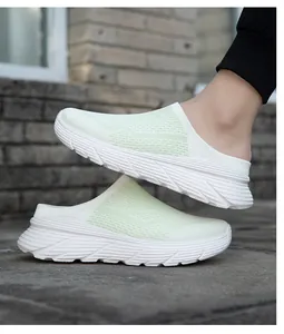 Side view of lightweight mesh outdoor mules with thick white breathable sole unit