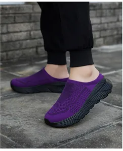 Purple breathable mesh slip-on clogs with thick black soles for casual outdoor wear.