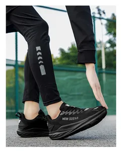 Close-up of black racing running shoes with breathable mesh and a cushioned sole