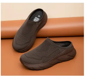 Detail view of brown breathable mesh slip-on mules with a thick outdoor platform sole