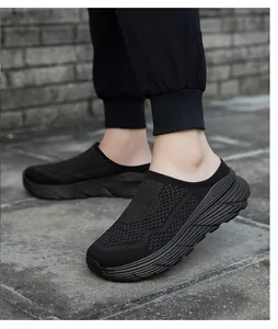 Detail view of breathable black mesh platform slip-on mules for outdoor casual wear