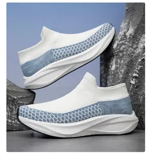 Detail of breathable knit slip-on sock shoes with cushioned thick white soles for casual sports.