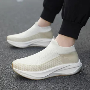 Stylish cream-colored flyknit sock shoes with thick white soles for men and women