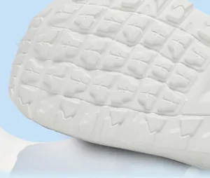 Close-up view of the non-slip white rubber sole of thick-bottomed casual sock shoes