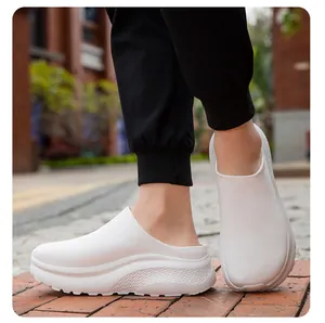Close-up detail of white thick sole casual sock slippers with knit mesh upper for men