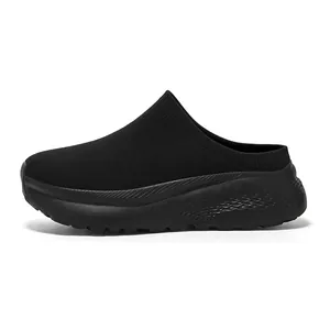 Comfortable men's black knit sock mule with thick cushioned sole for casual wear