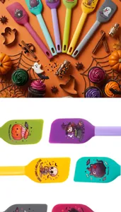 Close-up of colorful Halloween silicone spatulas with festive cartoon illustrations