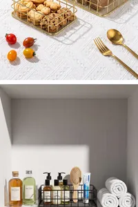 Detail view of minimalist iron storage baskets used for snacks and bathroom toiletries.