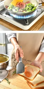 Heat-resistant silicone spatula used for stir-frying and spreading jam on bread.