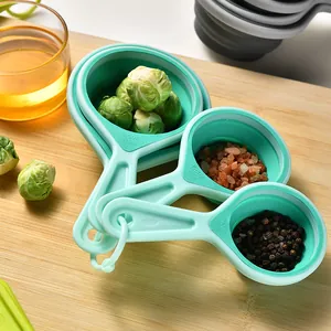 Collapsible silicone measuring cup and spoon set for baking with metric markings