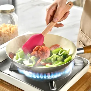 Espátula de silicona rosa resistente al calor con mango de madera para cocinar y freír
