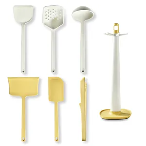 Modern 7-piece heat-resistant silicone kitchen utensil set with storage stand in yellow
