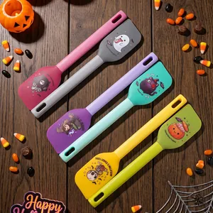 Set of Halloween themed silicone spatulas with festive cartoon designs and PP handles