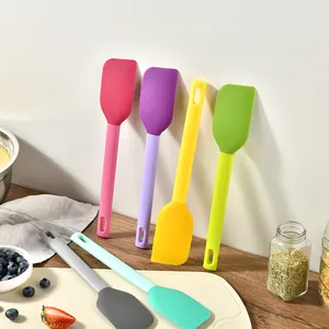 Vibrant set of colorful heat-resistant silicone baking spatulas for cream and cake