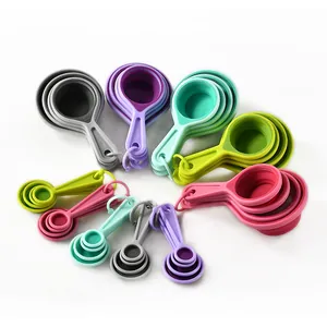 Collapsible silicone measuring cups and spoons set in vibrant colors for baking
