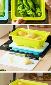 Detail view of the portable outdoor drain basket and cutting board set used in a kitchen sink