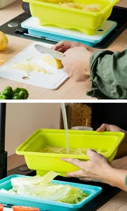 Detail view of multipurpose drain basket and cutting board set used for washing vegetables