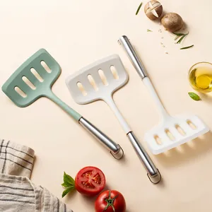 Espátulas ranuradas de silicona termorresistente con mango de acero inox para antiadherentes.