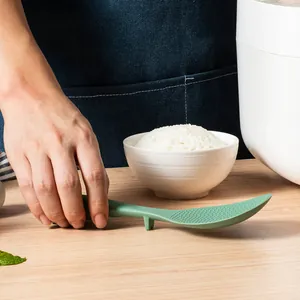 Standing non-stick rice spoon with ergonomic handle and heat-resistant design