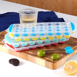 Professional stackable silicone ice cube trays with easy-release design and blue ice tongs