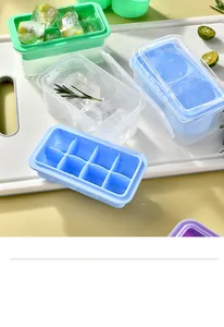 Close-up view of multi-color silicone ice cube trays with lids for whiskey drinks