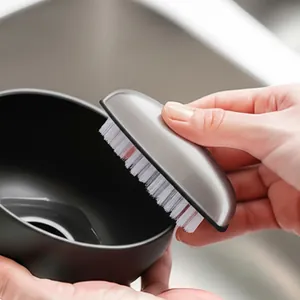 Ergonomic stainless steel cleaning brush for vegetables and odor removal in kitchen