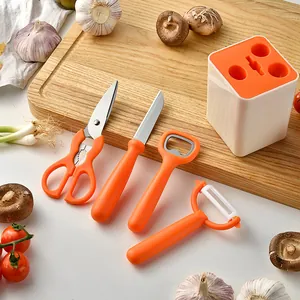 Complete 5-delige oranje keukengereedschapset met opbergblok dunschiller en schaar