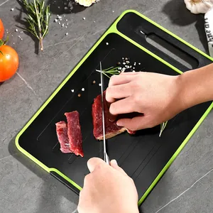 Double-sided aluminum defrosting cutting board for meat preparation on stone counter